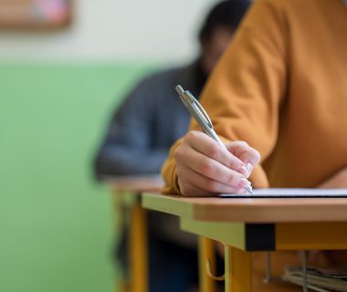 Students,Taking,Exam,In,Classroom.,Education,Test,And,Literacy,Concept.