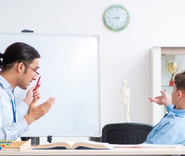 Young,Father,Helping,His,Son,To,Prepare,For,Exam